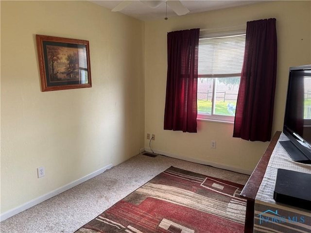 V-437 State Route 108, Napoleon, OH 43545 - carpeted spare room with ceiling fan and baseboards
