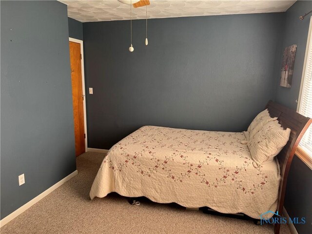 V-437 State Route 108, Napoleon, OH 43545 - bedroom featuring carpet floors and baseboards