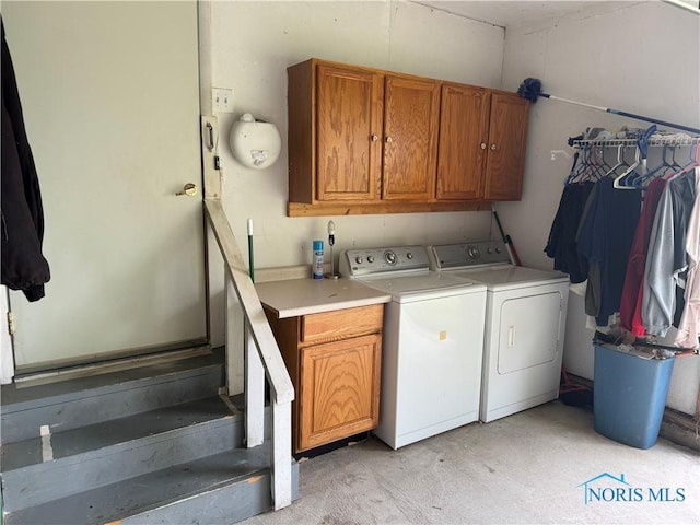 V-437 State Route 108, Napoleon, OH 43545 - washroom featuring cabinet space and washer and clothes dryer