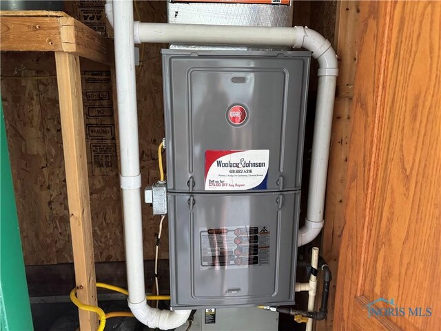 V-437 State Route 108, Napoleon, OH 43545 - utility room featuring water heater
