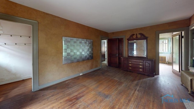 2720 Scottwood Ave, Toledo, OH 43610 - foyer featuring radiator, hardwood / wood-style flooring, and baseboards
