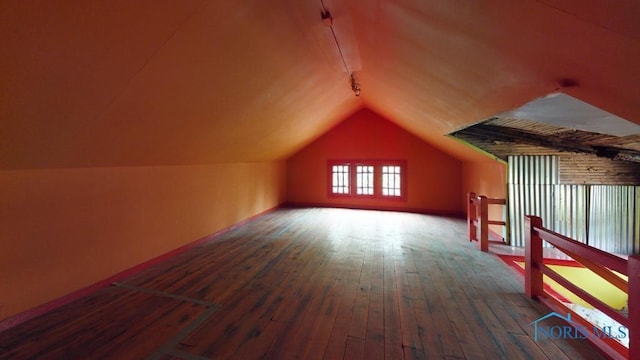 2720 Scottwood Ave, Toledo, OH 43610 - bonus room with vaulted ceiling, hardwood / wood-style flooring, and baseboards