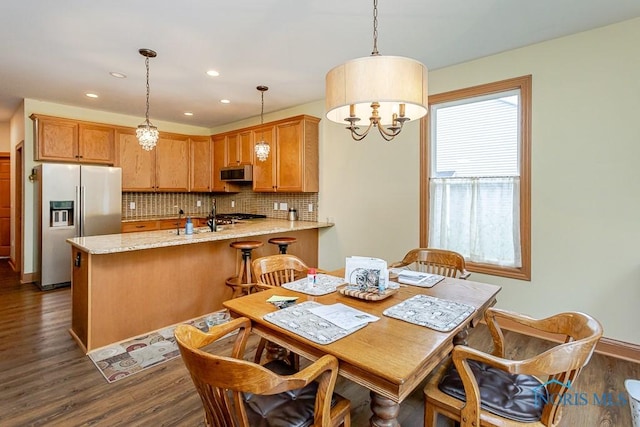 11023 Bay Trace Dr, Perrysburg, OH 43551 - dining area featuring dark wood-type flooring and recessed lighting