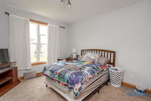 11023 Bay Trace Dr, Perrysburg, OH 43551 - bedroom featuring multiple windows, carpet, and baseboards