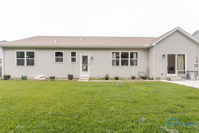 11023 Bay Trace Dr, Perrysburg, OH 43551 - rear view of house featuring entry steps, a yard, and roof with shingles