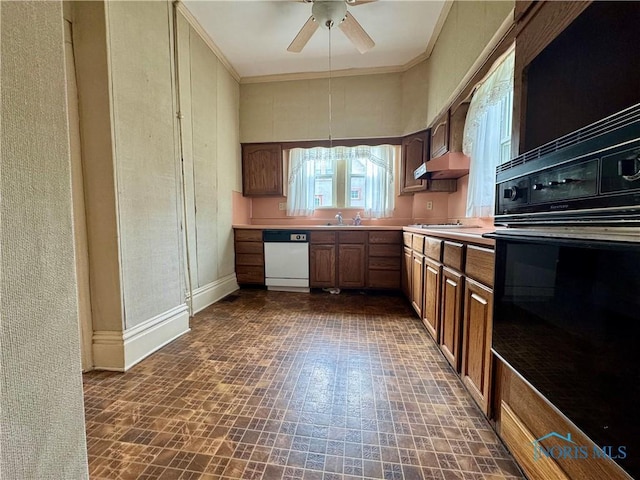 308 S Main St, Hicksville, OH 43526 - kitchen featuring white dishwasher, black oven, a ceiling fan, light countertops, and stainless steel stovetop