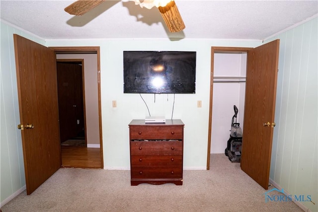 205 N Grant St, Paulding, OH 45879 - bedroom with carpet floors and ceiling fan