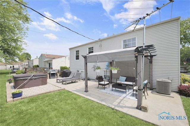 2444 Jamestown Dr, Northwood, OH 43619 - rear view of property with a hot tub, a patio, an outdoor living space, central AC unit, and a lawn