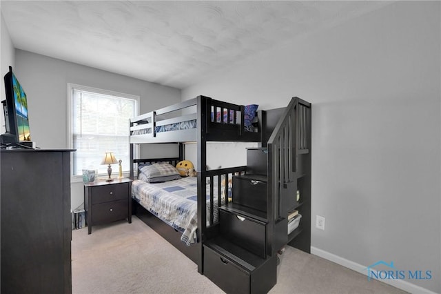 2444 Jamestown Dr, Northwood, OH 43619 - bedroom with carpet flooring and baseboards