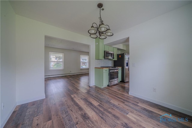 3849 Sylvanwood Dr, Sylvania, OH 43560 - kitchen featuring stainless steel appliances, green cabinetry, a chandelier, baseboard heating, and dark wood-style flooring