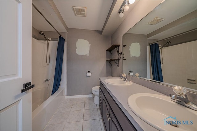 3849 Sylvanwood Dr, Sylvania, OH 43560 - full bath featuring shower / bath combination with curtain, double vanity, toilet, tile patterned flooring, and baseboards