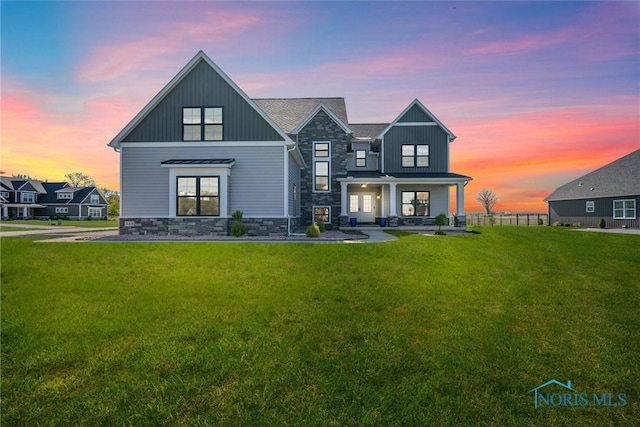 549 Canterbury Blvd, Perrysburg, OH 43551 - rear view of property with stone siding and a porch
