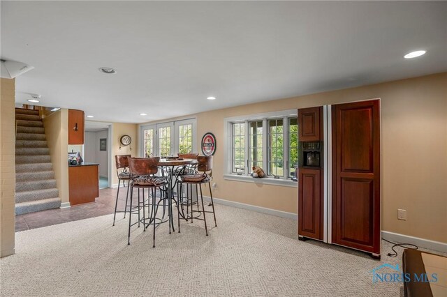 16890 W River Rd, Bowling Green, OH 43402 - dining room featuring recessed lighting, stairs, and baseboards