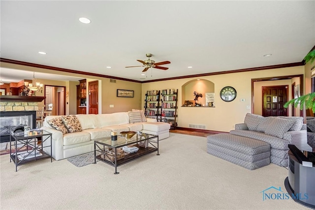 16890 W River Rd, Bowling Green, OH 43402 - living room with carpet flooring, recessed lighting, a ceiling fan, ornamental molding, and a fireplace