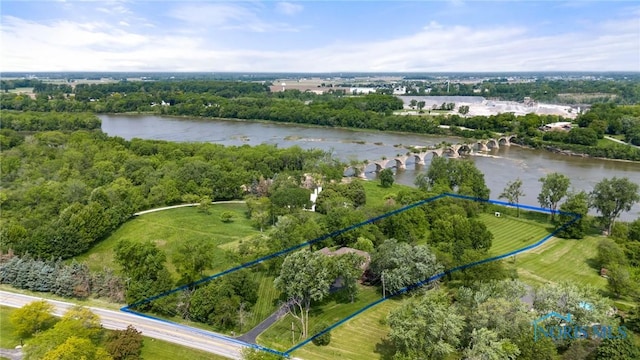 16890 W River Rd, Bowling Green, OH 43402 - aerial view of property and surrounding area featuring property parcel outlined and a nearby body of water