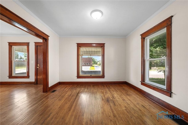 230 W S St, Fostoria, OH 44830 - unfurnished room with wood finished floors and crown molding
