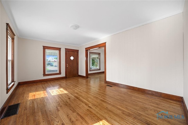 230 W S St, Fostoria, OH 44830 - entryway with wood finished floors and ornamental molding
