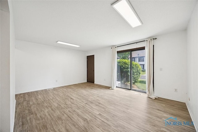 4519 W Bancroft St Unit 4, Toledo, OH 43615 - empty room featuring wood finished floors