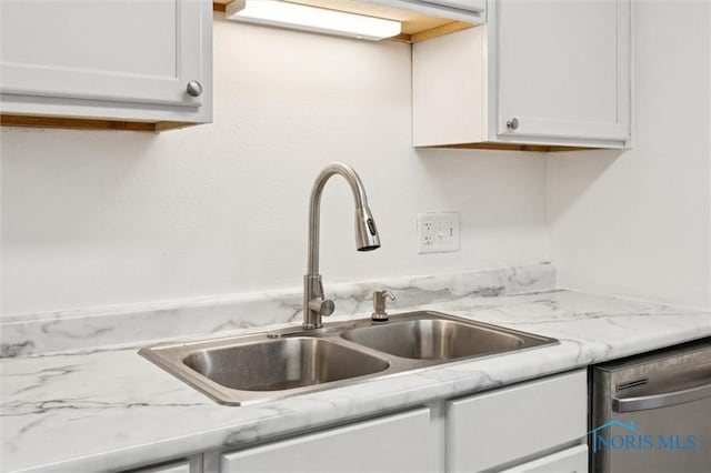 4519 W Bancroft St Unit 4, Toledo, OH 43615 - kitchen featuring a sink, dishwasher, white cabinets, and light stone countertops
