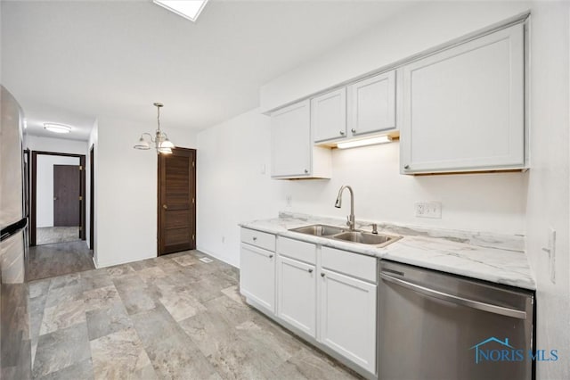 4519 W Bancroft St Unit 4, Toledo, OH 43615 - kitchen with stainless steel appliances, a sink, pendant lighting, and white cabinetry
