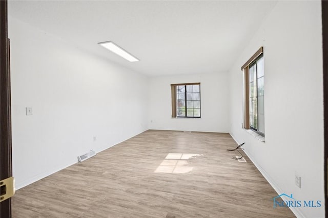 4519 W Bancroft St Unit 4, Toledo, OH 43615 - spare room with wood finished floors and baseboards