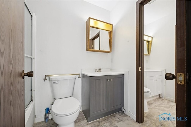 4519 W Bancroft St Unit 4, Toledo, OH 43615 - full bathroom with toilet, vanity, and baseboards