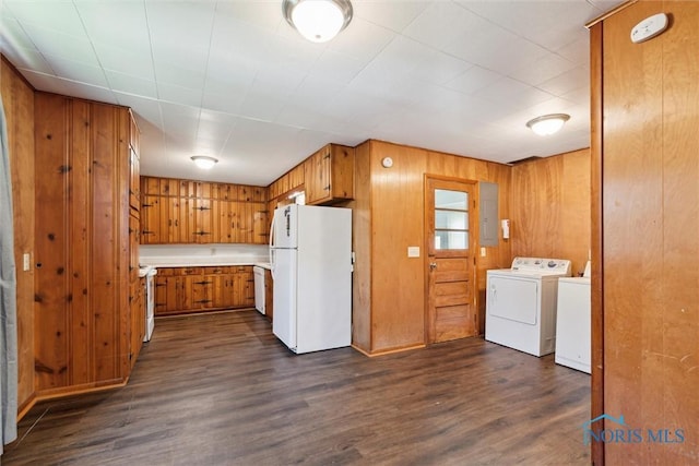 308 Edith Ave, Findlay, OH 45840 - kitchen with freestanding refrigerator, washing machine and clothes dryer, brown cabinetry, electric panel, and dark wood finished floors