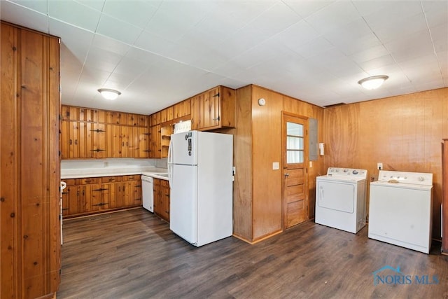 308 Edith Ave, Findlay, OH 45840 - laundry room with washing machine and clothes dryer, dark wood finished floors, and wooden walls