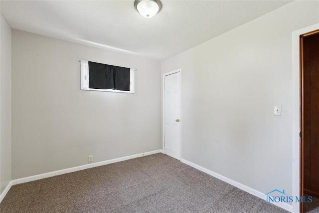 308 Edith Ave, Findlay, OH 45840 - carpeted spare room with baseboards