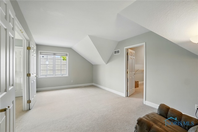 7433 Valhalla Dr, Maumee, OH 43537 - bonus room with light colored carpet, baseboards, and lofted ceiling