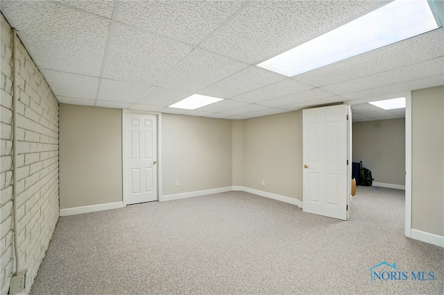 7433 Valhalla Dr, Maumee, OH 43537 - finished basement featuring a drop ceiling, carpet, and baseboards