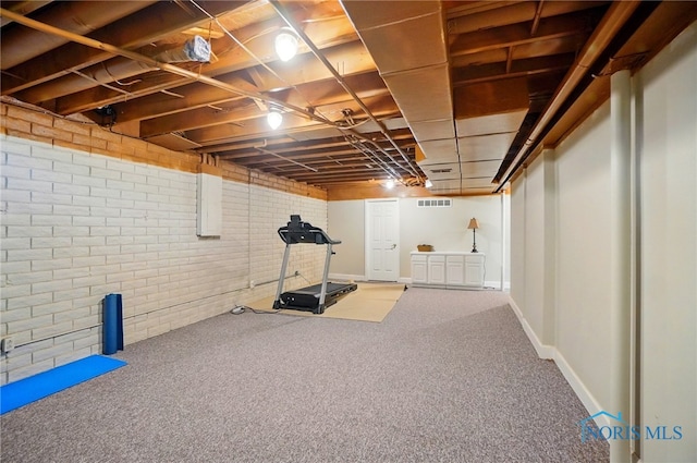 7433 Valhalla Dr, Maumee, OH 43537 - unfinished basement featuring brick wall and carpet flooring