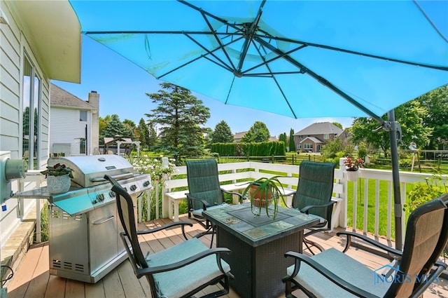 7433 Valhalla Dr, Maumee, OH 43537 - wooden deck with a grill