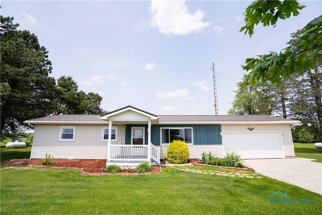 15480 State Route 18, Holgate, OH 43527 - single story home featuring a porch, driveway, a garage, and a front lawn