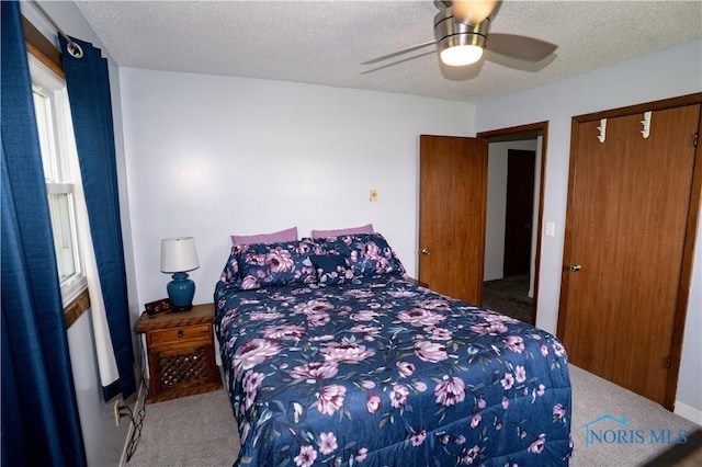 15480 State Route 18, Holgate, OH 43527 - bedroom with carpet, a closet, a textured ceiling, and ceiling fan