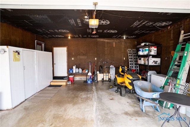 15480 State Route 18, Holgate, OH 43527 - garage featuring a garage door opener and wooden walls