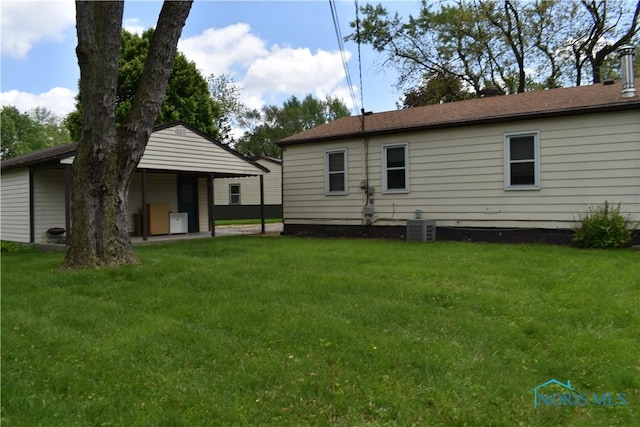 38 N Melody Ln, Waterville, OH 43566 - rear view of property with a lawn