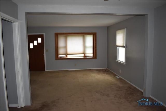 38 N Melody Ln, Waterville, OH 43566 - carpeted spare room featuring baseboards