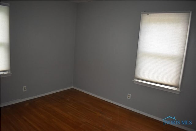 38 N Melody Ln, Waterville, OH 43566 - empty room featuring healthy amount of natural light, wood finished floors, and baseboards