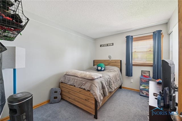 2546 Redfox Dr, Toledo, OH 43611 - bedroom featuring carpet floors, a textured ceiling, and baseboards