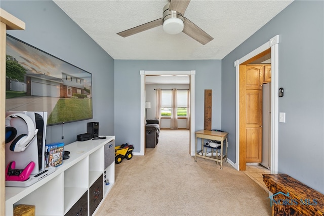 2546 Redfox Dr, Toledo, OH 43611 - office area featuring light colored carpet, ceiling fan, a textured ceiling, and baseboards