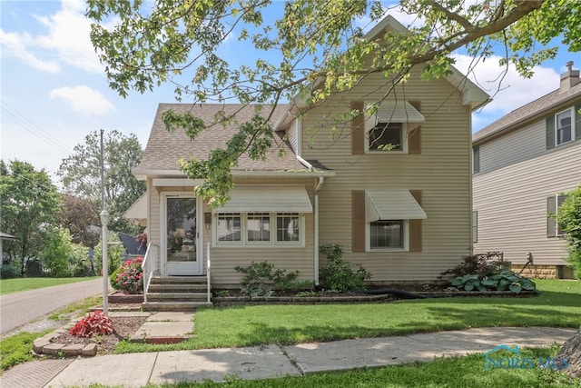 700 Franklin Ave, Findlay, OH 45840 - view of front of property with a front yard and roof with shingles