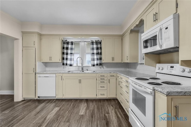 700 Franklin Ave, Findlay, OH 45840 - kitchen with white appliances, a sink, dark wood-style floors, tasteful backsplash, and cream cabinets
