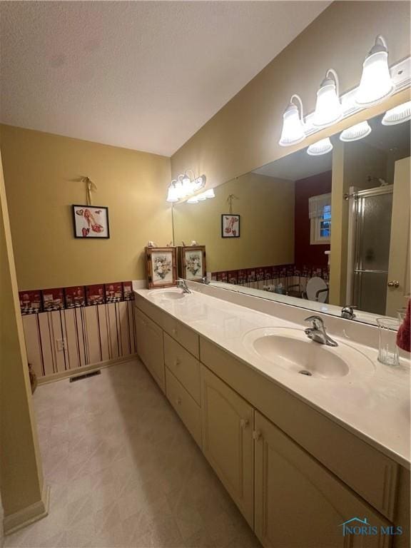 1245 Countryside Dr, Findlay, OH 45840 - full bath with a stall shower, double vanity, and tile patterned floors