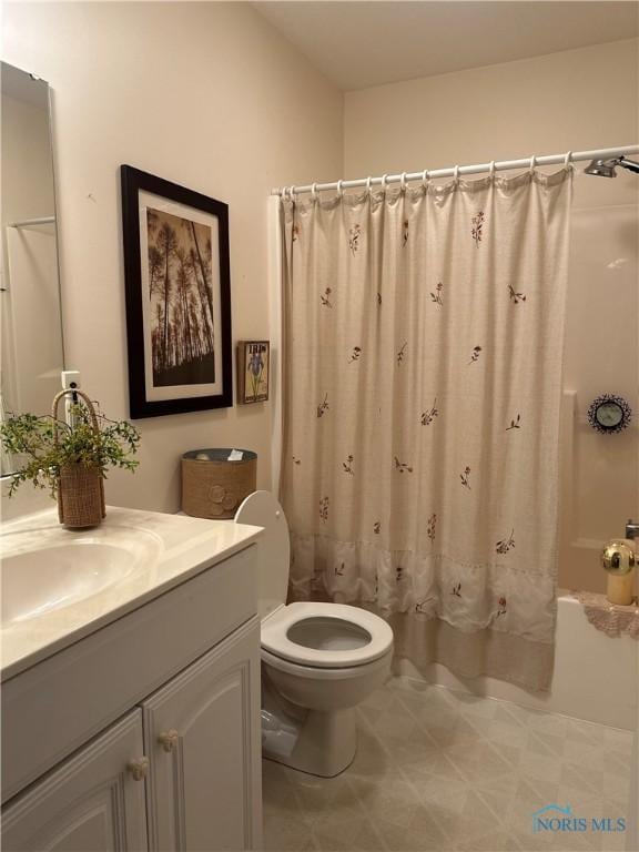 1245 Countryside Dr, Findlay, OH 45840 - bathroom featuring vanity, shower / bathtub combination with curtain, and toilet