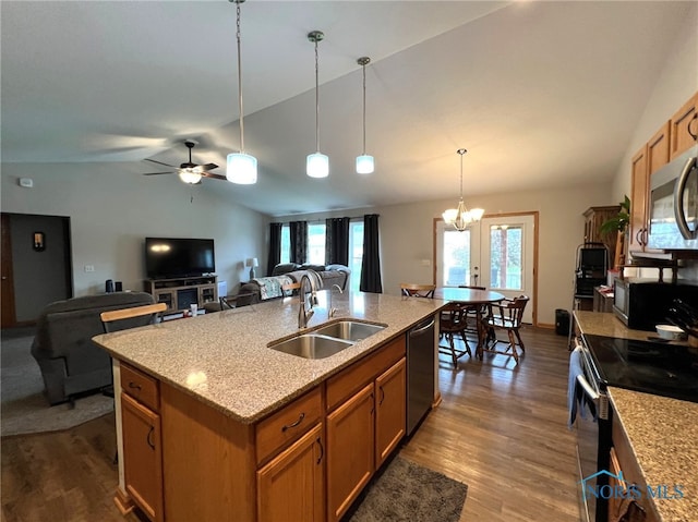 606 Polaris Dr, Upper Sandusky, OH 43351 - kitchen featuring a sink, appliances with stainless steel finishes, vaulted ceiling, dark wood finished floors, and pendant lighting