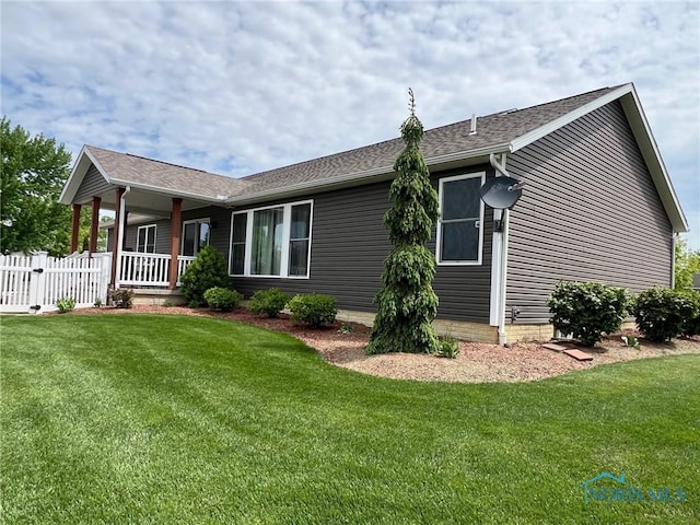 606 Polaris Dr, Upper Sandusky, OH 43351 - rear view of property featuring a porch and roof with shingles