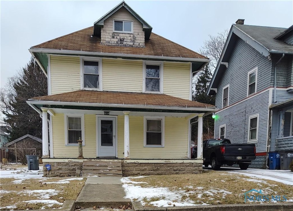 2542 Maplewood Ave, Toledo, OH 43610 - american foursquare style home with covered porch and a shingled roof
