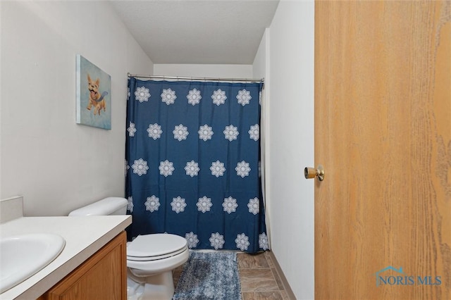 1058 Rockcress Dr, Toledo, OH 43615 - bathroom with vanity, toilet, and a shower with curtain