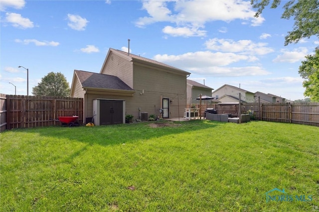 1058 Rockcress Dr, Toledo, OH 43615 - rear view of house featuring cooling unit and an outdoor hangout area